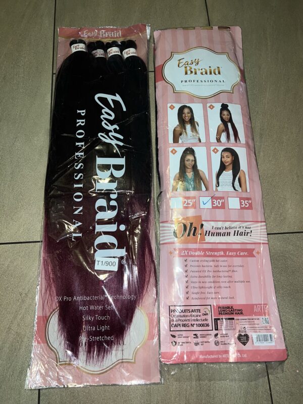 A package of hair extensions and a box.